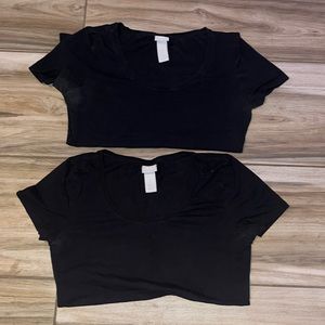 Two woman’s H&M black short sleeve shirts, size small